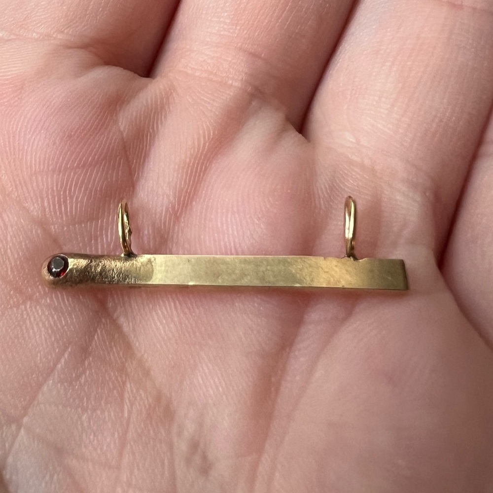 14k YG matchstick pendant with garnet